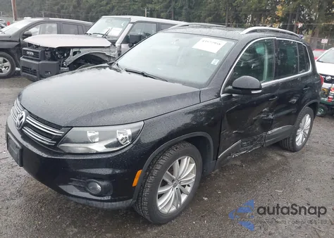 2014 Volkswagen Tiguan Sel from USA, damaged, VIN WVGAV3AX8EW611820